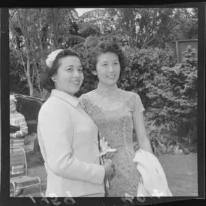 Two unidentified women at a fashion show in the garden at Homewood, Karori, Wellington