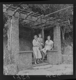 Unidentified women in the pergola at a fashion show at Homewood, Karori, Wellington