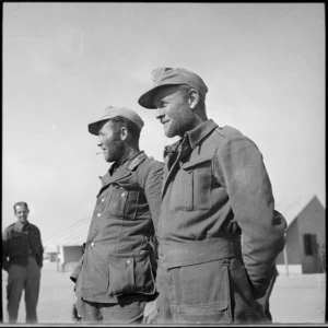 NZ former prisoners wearing German hats at NZ Base Camp, Egypt - Photograph taken by M D Elias