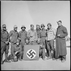 NZ former prisoners with German military souvenirs at NZ Base Camp, Egypt - Photograph taken by M D Elias