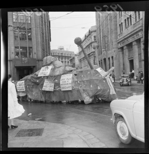 Snail float at capping day parade, Corner of Hunter Streets and Lambton Quay, Wellington