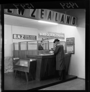 Unidentified man banking at the Bank of New Zealand booth at the Wellington Industries Fair