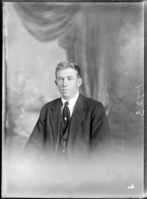 Head and shoulders studio portrait of unidentified man dressed in a suit, probably Christchurch district