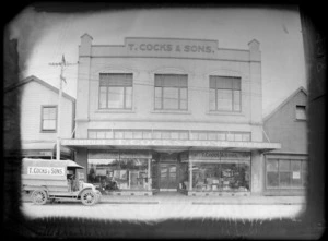 Business of T Cocks & Sons, probably Christchurch district, shows store and truck parked outside