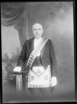 Studio portrait of an unidentified freemason, wearing a sash and masonic apron, Christchurch