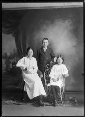 Family group, showing unidentified boy and two girls, Christchurch