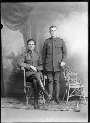 Studio portrait of two unidentified men, wearing military uniforms, Christchurch