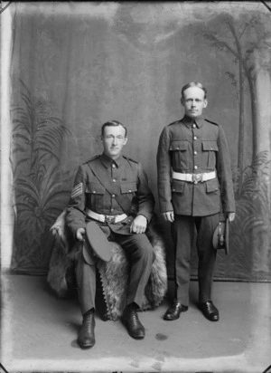 Studio portrait of two unidentified men wearing military uniform, possibly Christchurch