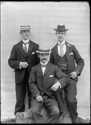 Portrait of three unidentified men, two wearing straw boaters, and one wearing a homburg hat, possibly Christchurch