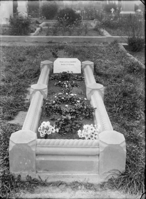 A child's grave, with a headstone reading 'Dear Little Daisy, Aged 6 Years', possibly Christchurch