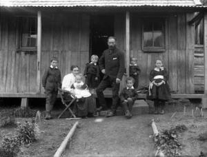 The Gate family outside their house, Tahora, Taranaki
