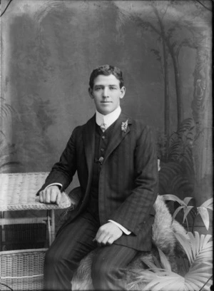 Studio portrait of an unidentified young man, sitting, possibly Christchurch district