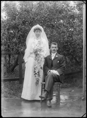 Wedding portrait of an unidentified bride and groom in an outdoor location, possibly Christchurch