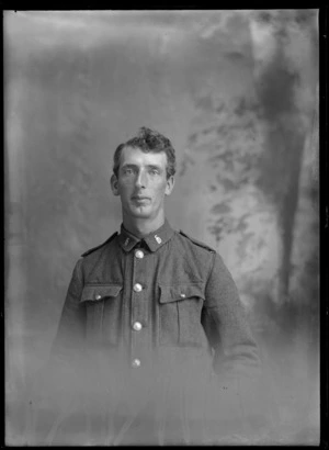Studio upper torso portrait of unidentified World War One soldier with 'C10' collar badges [C Squadron, 10th Reinforcements?], Christchurch