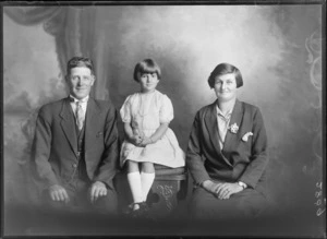 Studio portrait of an unidentified family group, showing a man, woman, and young girl, possibly Christchurch district
