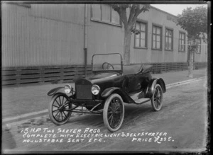 Advertisement for a 15 horse powered two seater Argo motorcar, complete with electric light and self starter, adjustable seat etc, price [£295 ?], probably Hastings district