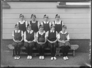 Hastings High School, Huia "B" girl's basketball team in school uniforms and caps, Hastings, Hawke's Bay District