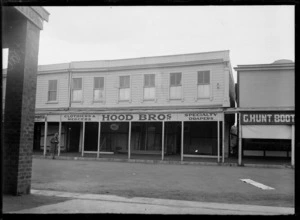 Street view of the closed Hood Brothers specialty draper's store, and other commercial buildings after the Hawkes Bay earthquake, Waipawa, Hawke's Bay District