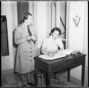 Miss Meryll Neely at her desk in the NZ Forces Club, Cairo, Egypt