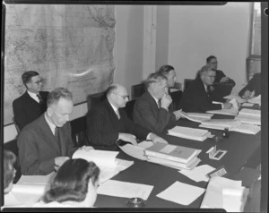 SPATC, showing WH Burchett, Secretary of SPATC, Hon F Jones, New Zealand Minister in charge of the Air Department, Foss Shanahan, Acting Secretary of External Affairs, New Zealand, and TA Barrow, New Zealand Air Secretary, all seated at conference table