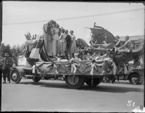 New Napier Week Carnival, young women with a Viking Ship float on the back of a truck, preparing for the parade, Napier, Hawke's Bay District