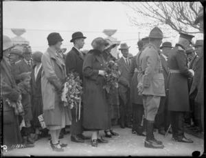 Men and women with garlands of flowers, greeting the Governor General, Lord Bledisloe, Hawke's Bay District