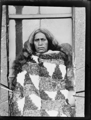 Maori woman wrapped in a cloak, Hawke's Bay District
