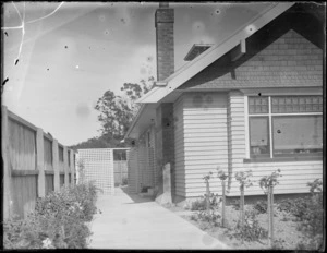 House, probably Hastings district, showing exterior and garden