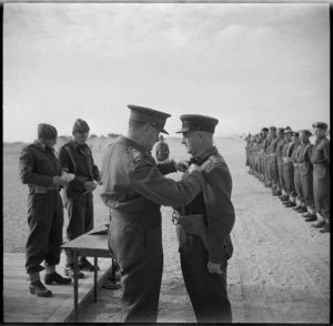 Brigadier Kenneth MacCormick receives the CBE from General Auchinleck at Maadi, World War II