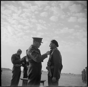 General Auchinleck decorates Major Harford of the Divisional Cavalry at Maadi, World War II