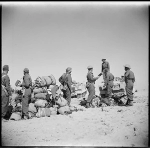 Light armoured units dump gear and receive orders during Divisional manoeuvres after the Libyan Campaign