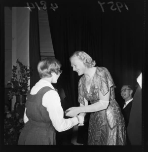 Lady Cobham, presenting a prize to a schoolgirl, Onslow College, Johnsonville, Wellington