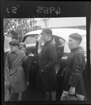 Partially blind children getting out of car, Te Aro School, Wellington