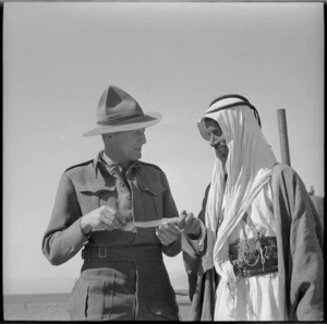 New Zealander bargaining for a knife at Aqaba - Photograph taken by M D Elias
