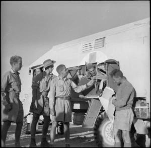 Shell hole in side of American Field Service ambulance in withdrawal from Minqar Qaim, Egypt - Photograph taken by H Paton