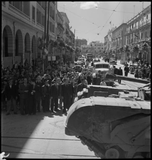 Members of local population watch British tank passing through the street, Tunis - Photograph taken by M D Elias