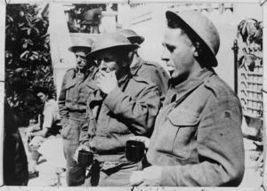 Some of the NZ soldiers, who escorted the King of the Hellenes out of Crete, having tea in Egypt
