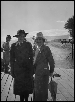 Mrs Freyberg and Miss Meryll Neely welcoming the first party of Women's War Serice Auxiliary to arrive in Egypt