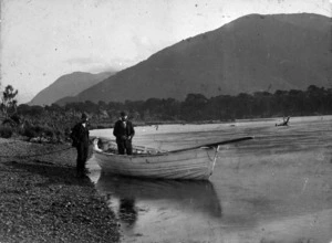 D J McKenzie in his boat, Hollyford River, Otago
