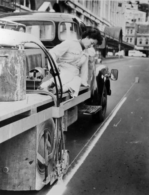 Heather Orsborn renewing white road markings, Wellington