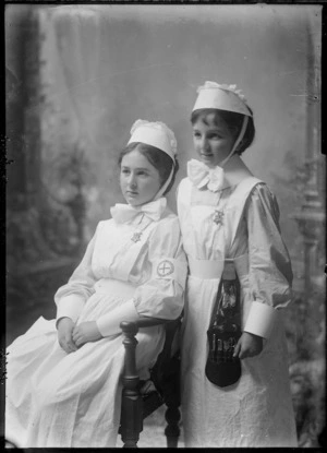 Girls from the Paget family in Wellington Hospital nursing uniforms