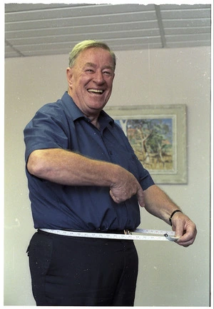 Ken Douglas demonstrating his weight loss - Photograph taken by Phil Reid