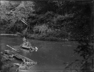 Creator unknown: Photograph of men travelling up a river, Rawene, Hokianga