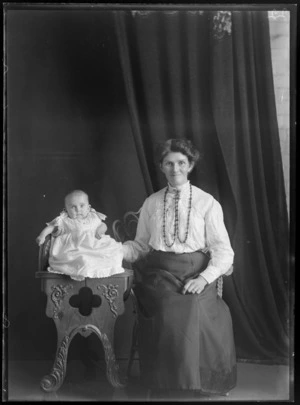 Studio portrait of an unidentified woman and baby, possibly Christchurch district