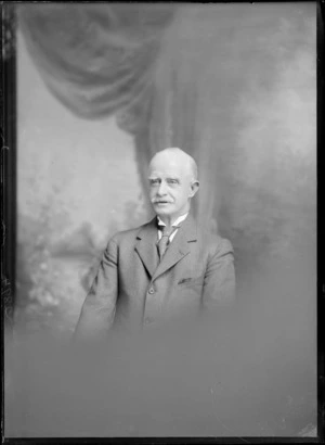 Studio portrait of the upper torso of an unidentified man dressed in a suit and tie, possibly Christchurch district