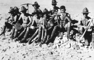 World War II soldiers of the 1st Contingent taking a break from digging of weapon pits training, Egypt