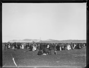 Crowd listening to a band, during a meeting of the Maori parliament at Pakirikiri near Gisborne