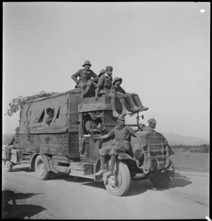 'Motorised POW Unit' advances into British camps in Tunisia - Photograph taken by M D Elias