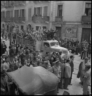 Truckload of tommies and locals pass through the streets of Tunis - Photograph taken by M D Elias