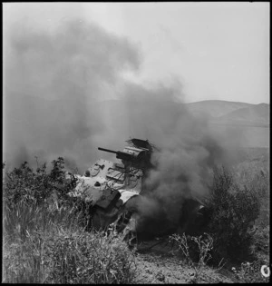 Burning Italian armoured car, Tunisia - Photograph taken by M D Elias